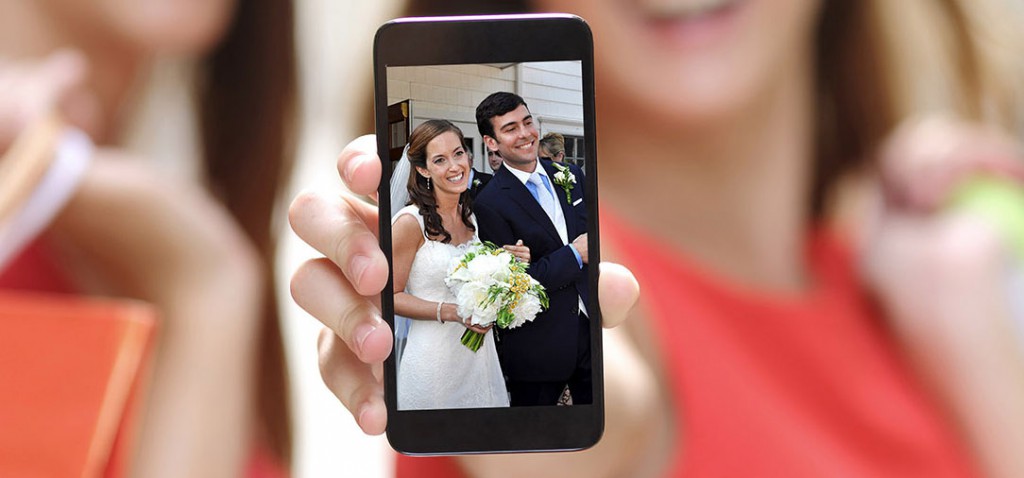 iphone med bröllopsbild